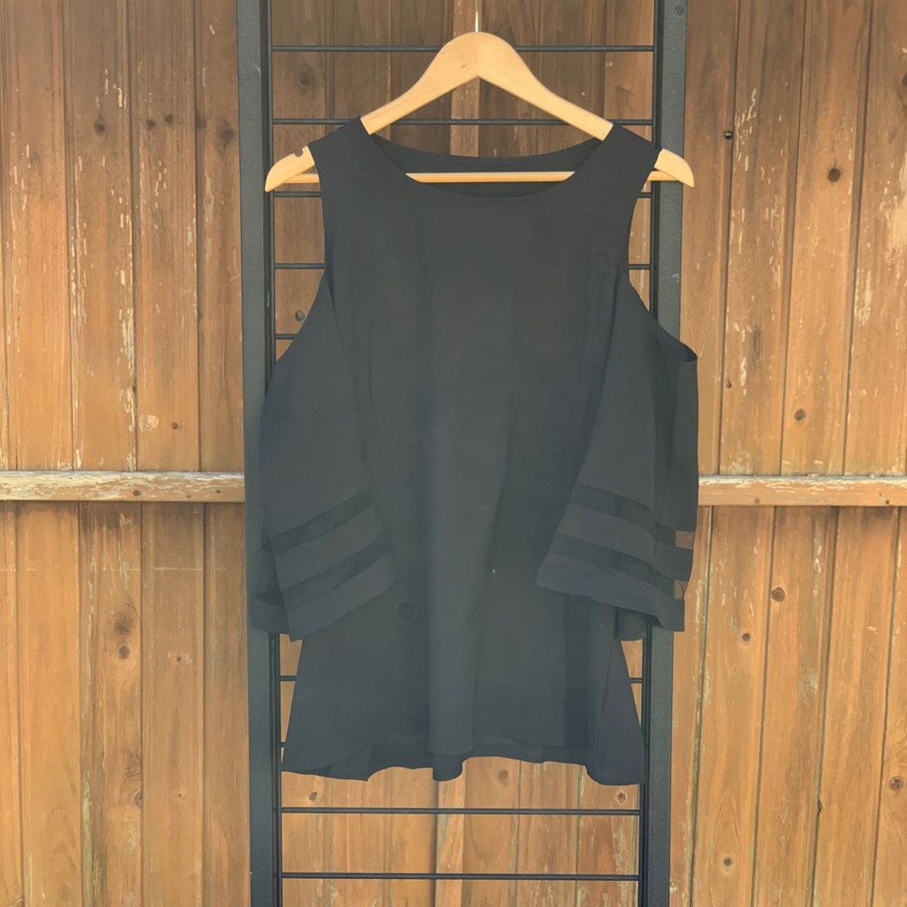 Cold shoulder bell sleeved top
